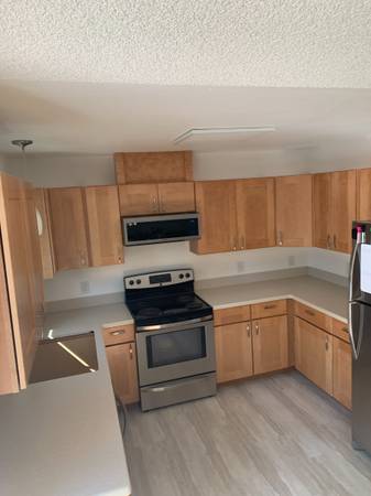 Kitchen remodel with new cabinets and flooring
